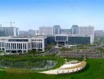 Yancheng Maternal and Child Health Hospital exterior panoramic view. A national Grade 3A hospital specializing in women and children's health since 1986.